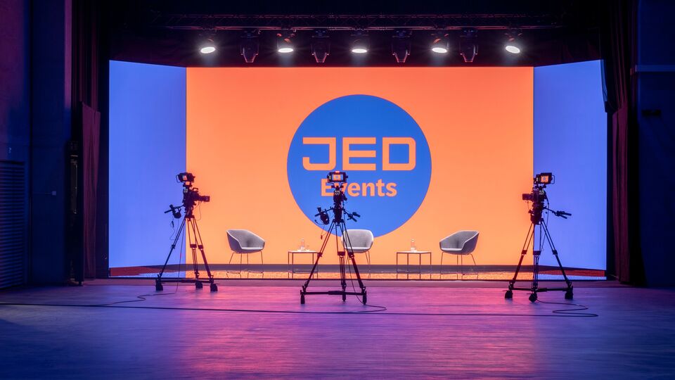 Stage with JED logo at a streaming event in the JED Events hall.