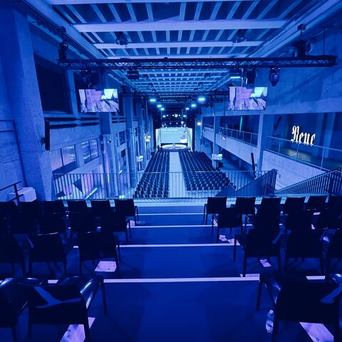 Seated congress hall with stage in the JED Events hall.
